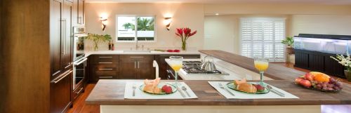 Three kitchens with various cabinet finishes