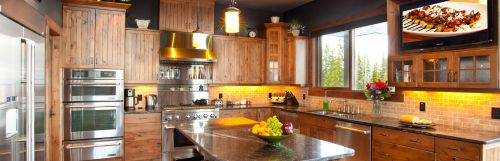 Warm cabinet finish in beautiful kitchen design