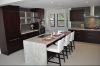 Dark stained cabinets in contemporary kitchen