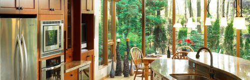 Beautiful kitchen cabinets overlooking green space